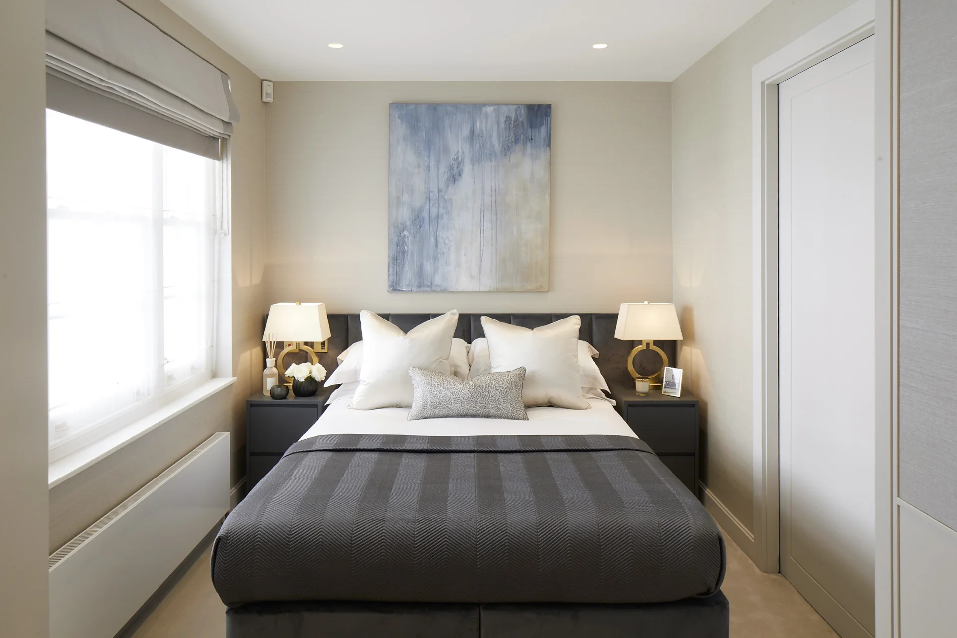 Striking double bedroom with contemporary artwork