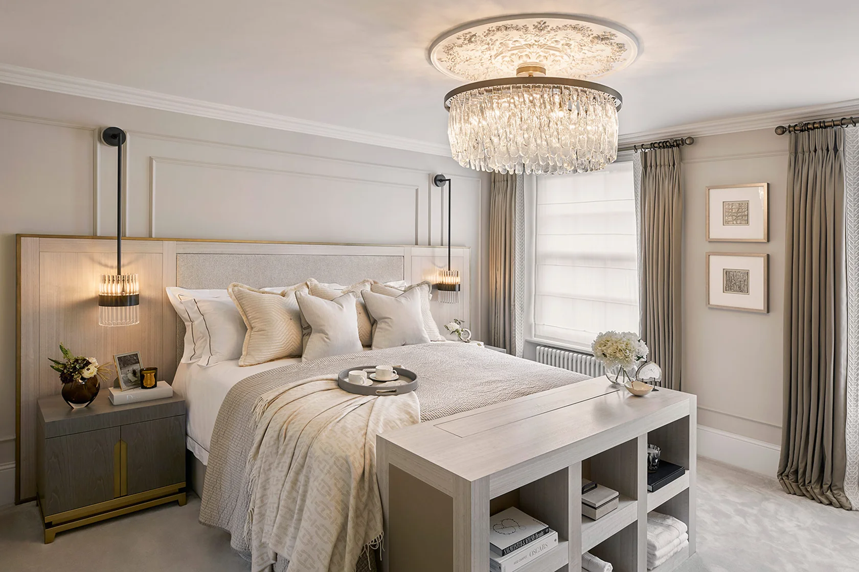 Modern bedroom featuring a plush bed, elegant chandelier, and stylish decor elements.