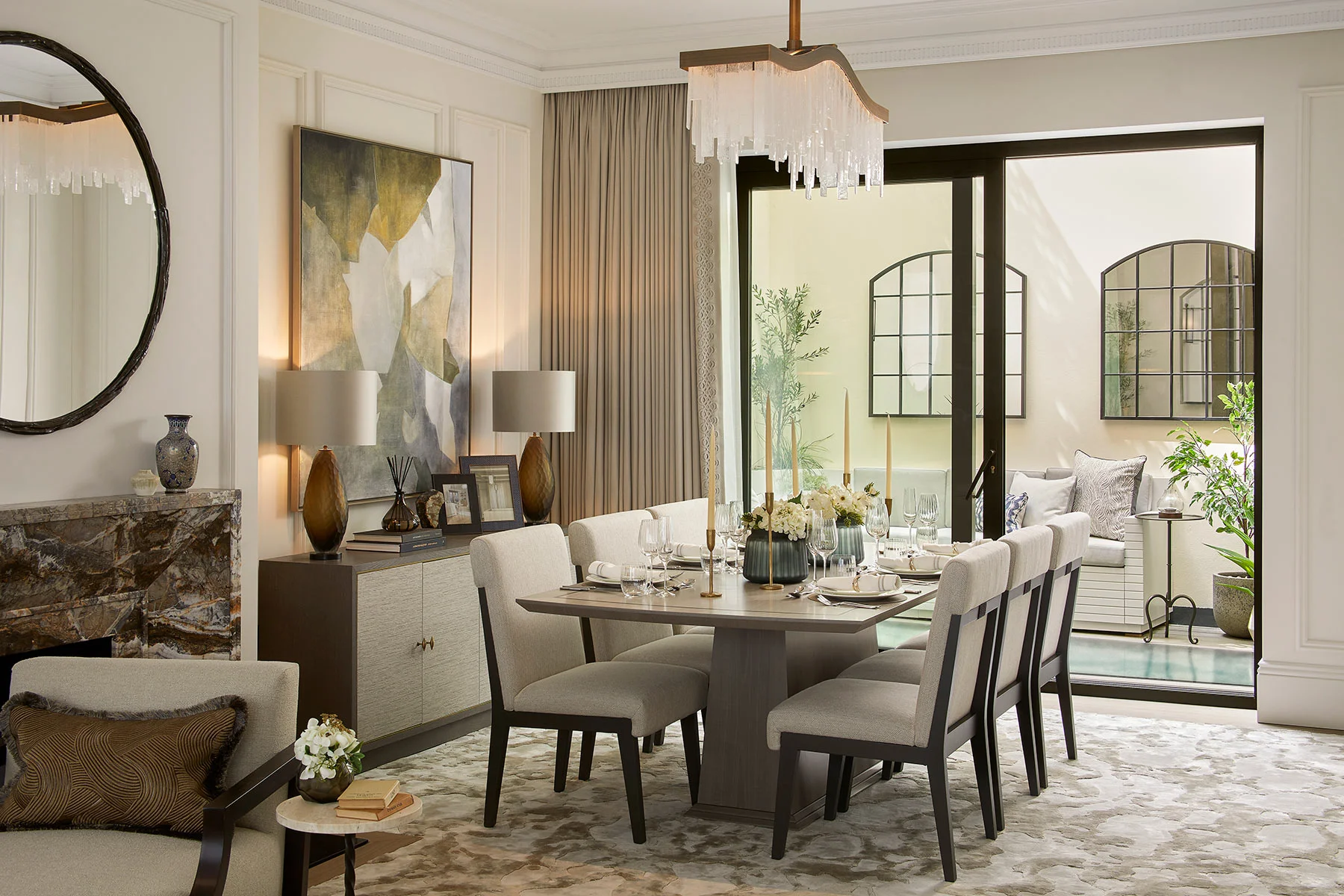 elegant dining room with contemporary artwork and view to the outside